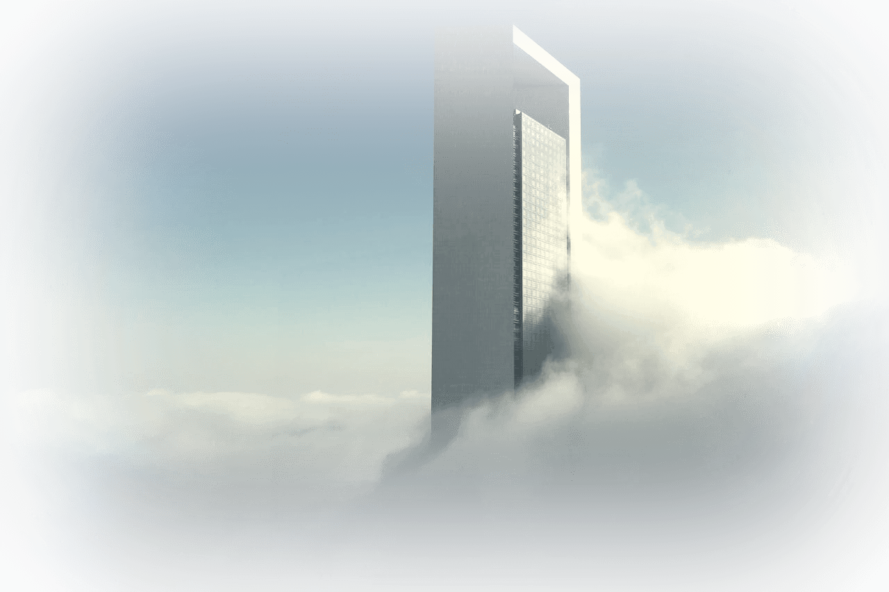 Skyscraper rising into bright mist