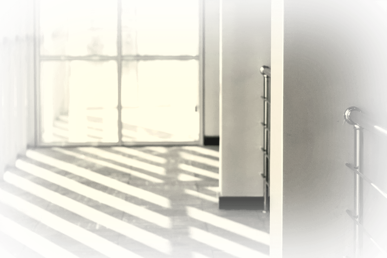 Bright glass-walled corridor