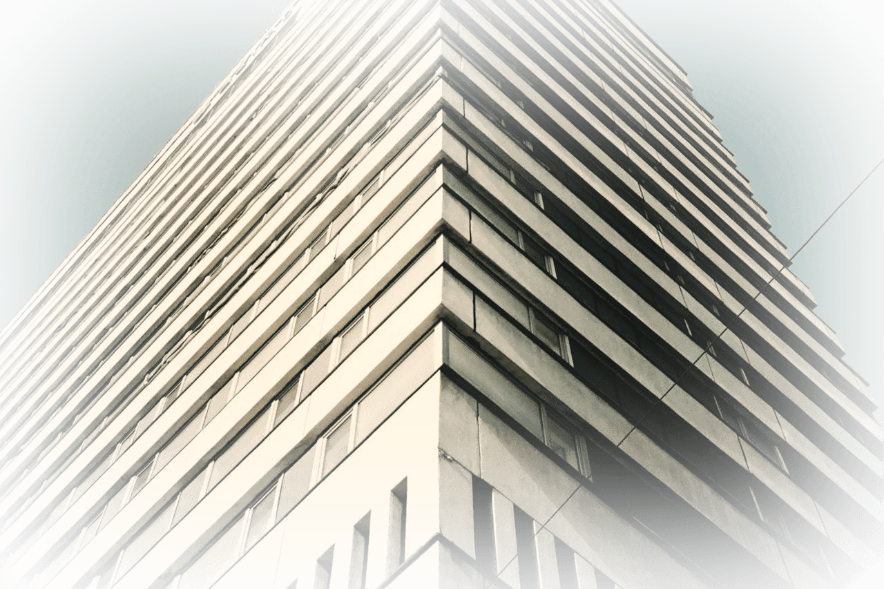 Corner of a minimalist building against the sky